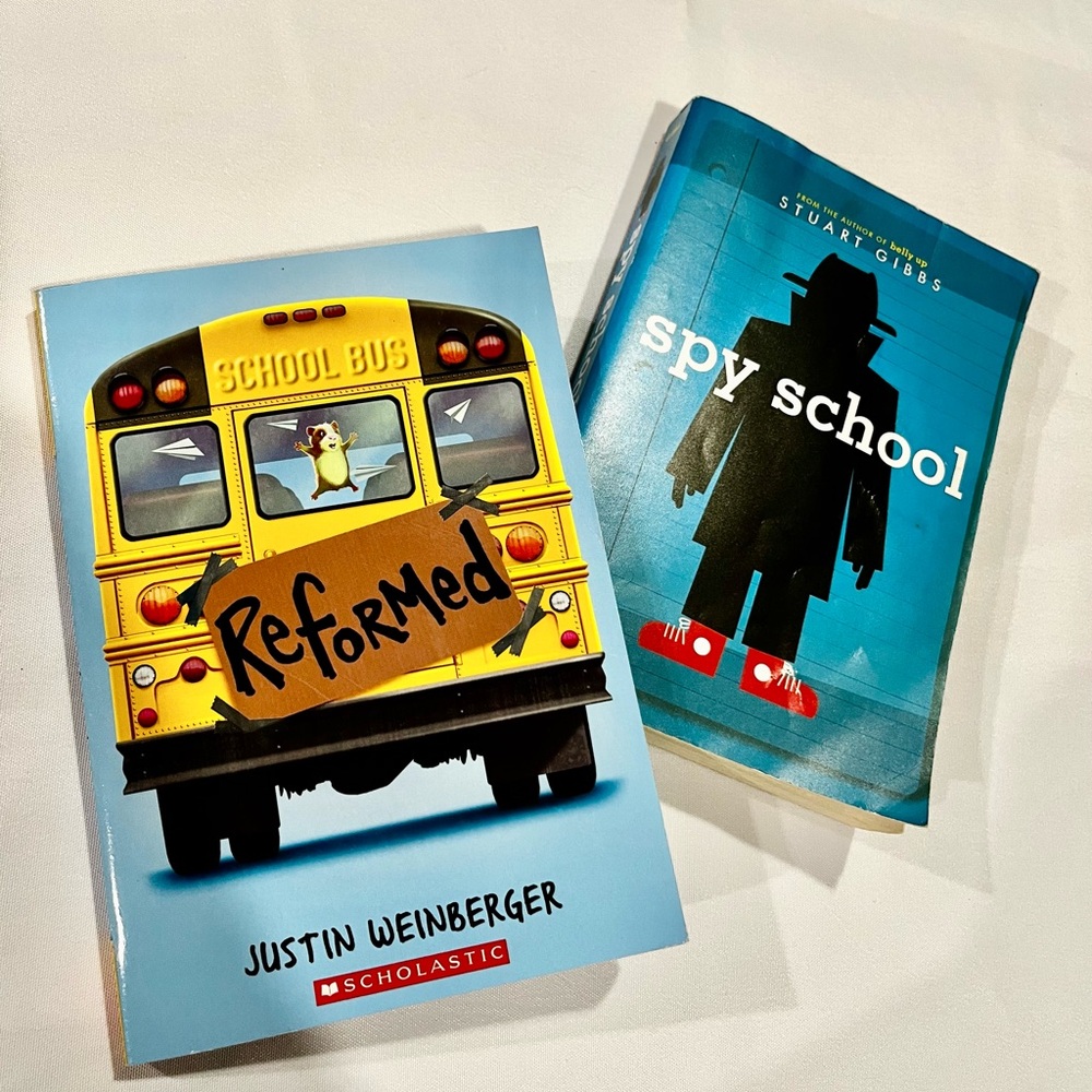 “Reformed” by Justin Weinberger and “Spy School” by Stuart Gibbs